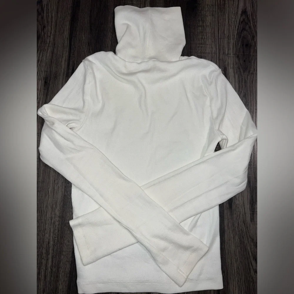 Elegant Black and White Turtleneck Tops - Picture 3 of 4